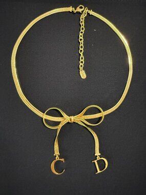 Christian Dior Gold Ribbon Bow CD Logo Dangle Snake Chain Choker Necklace